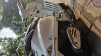 White Vespa SXL 150