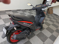 Red And Grey Aprilia SR 175 hp.e