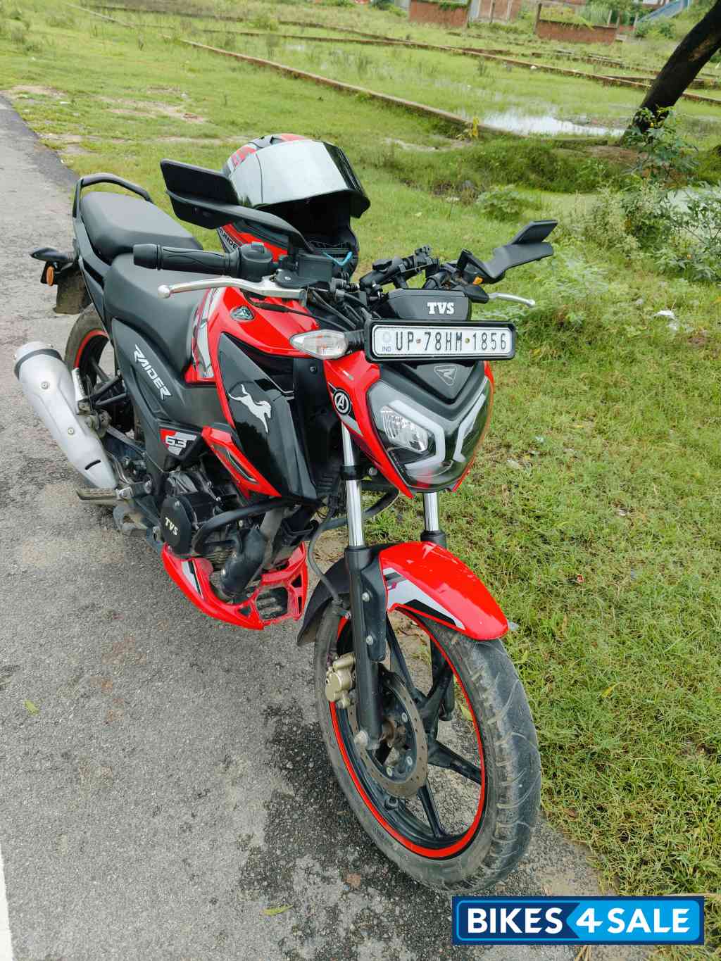 Red TVS Raider 125 Marvel Super Squad Edition