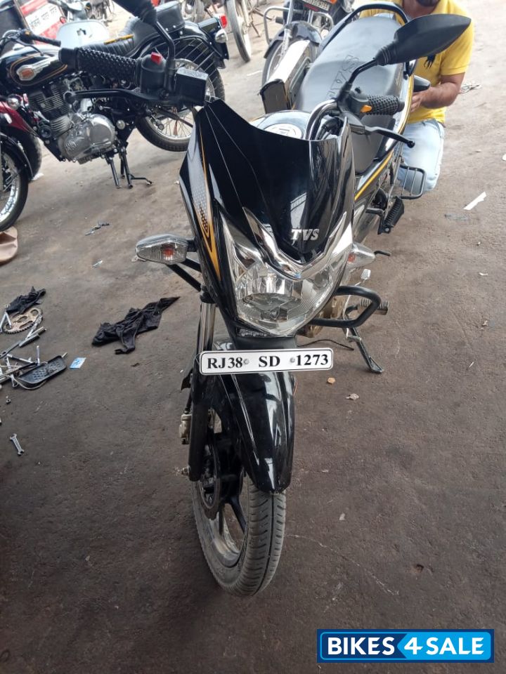 Black And Yellow TVS Victor Premium Edition