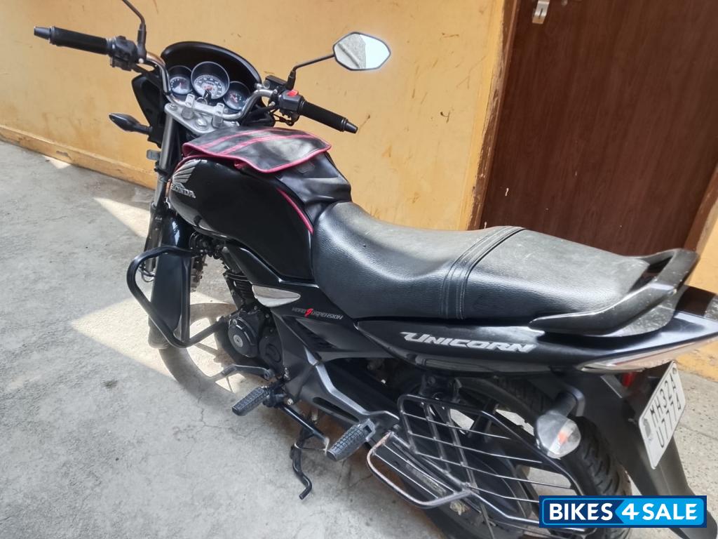 Black Honda Unicorn