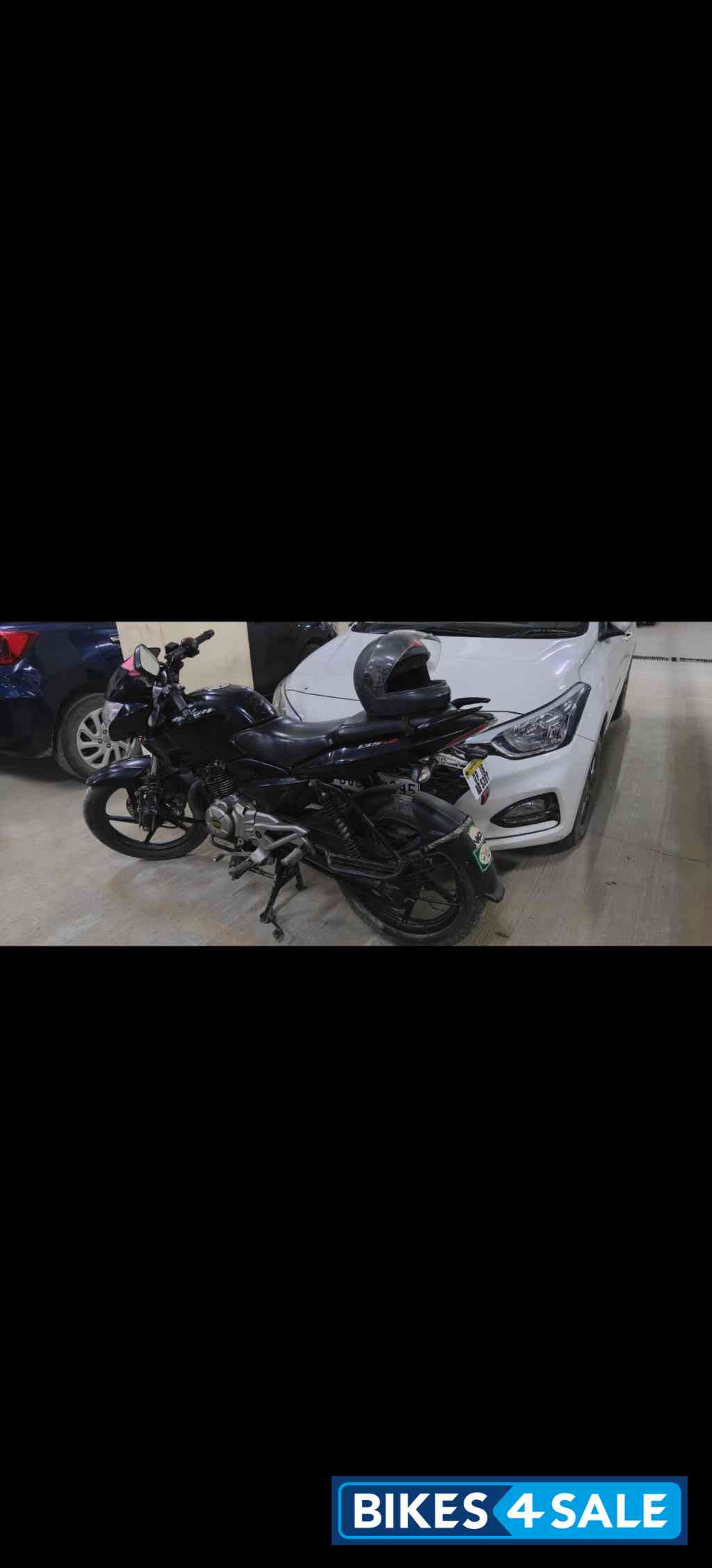 Black Bajaj Pulsar 135LS
