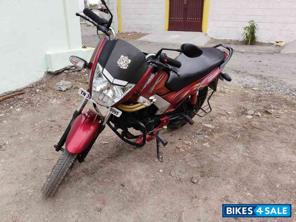 Red Mahindra Centuro