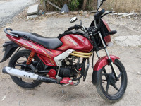 Red Mahindra Centuro