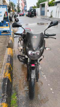 Red/black Bajaj Pulsar 150 Neon