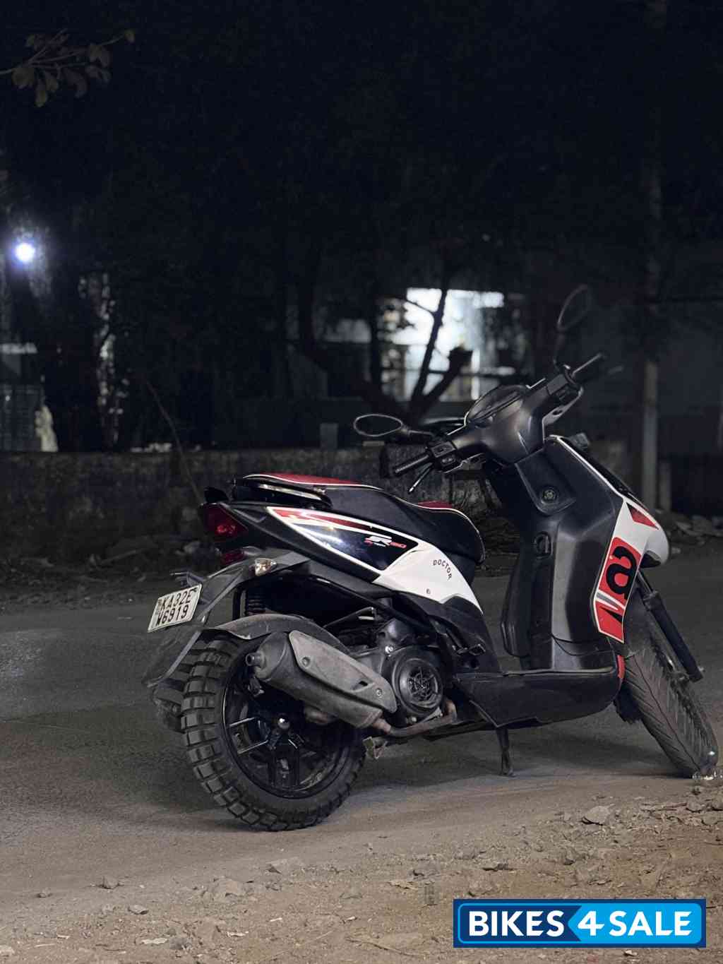 White And Black Aprilia SR 150