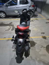 Black Aprilia SR 150