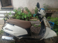 White Suzuki Access 125