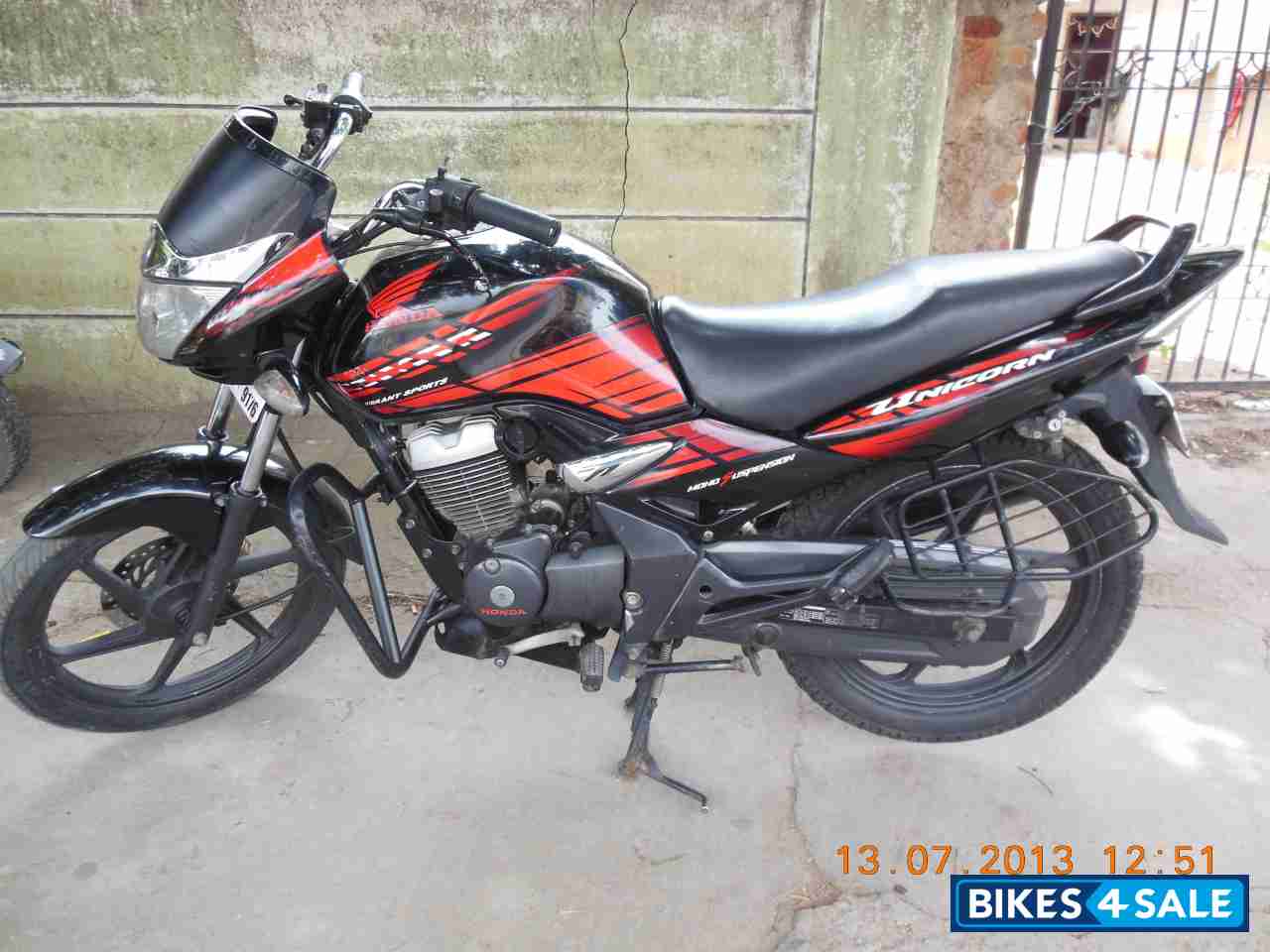 Black Honda Unicorn Sporty