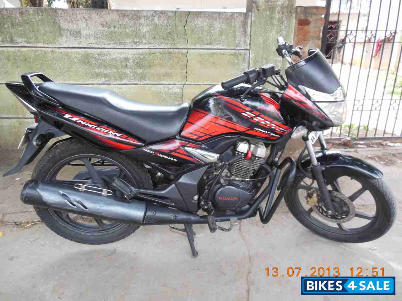 Black Honda Unicorn Sporty