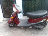 Maroon Bajaj Spirit