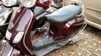 Maroon Vespa LX 125