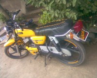 Yellow Yamaha RX 100