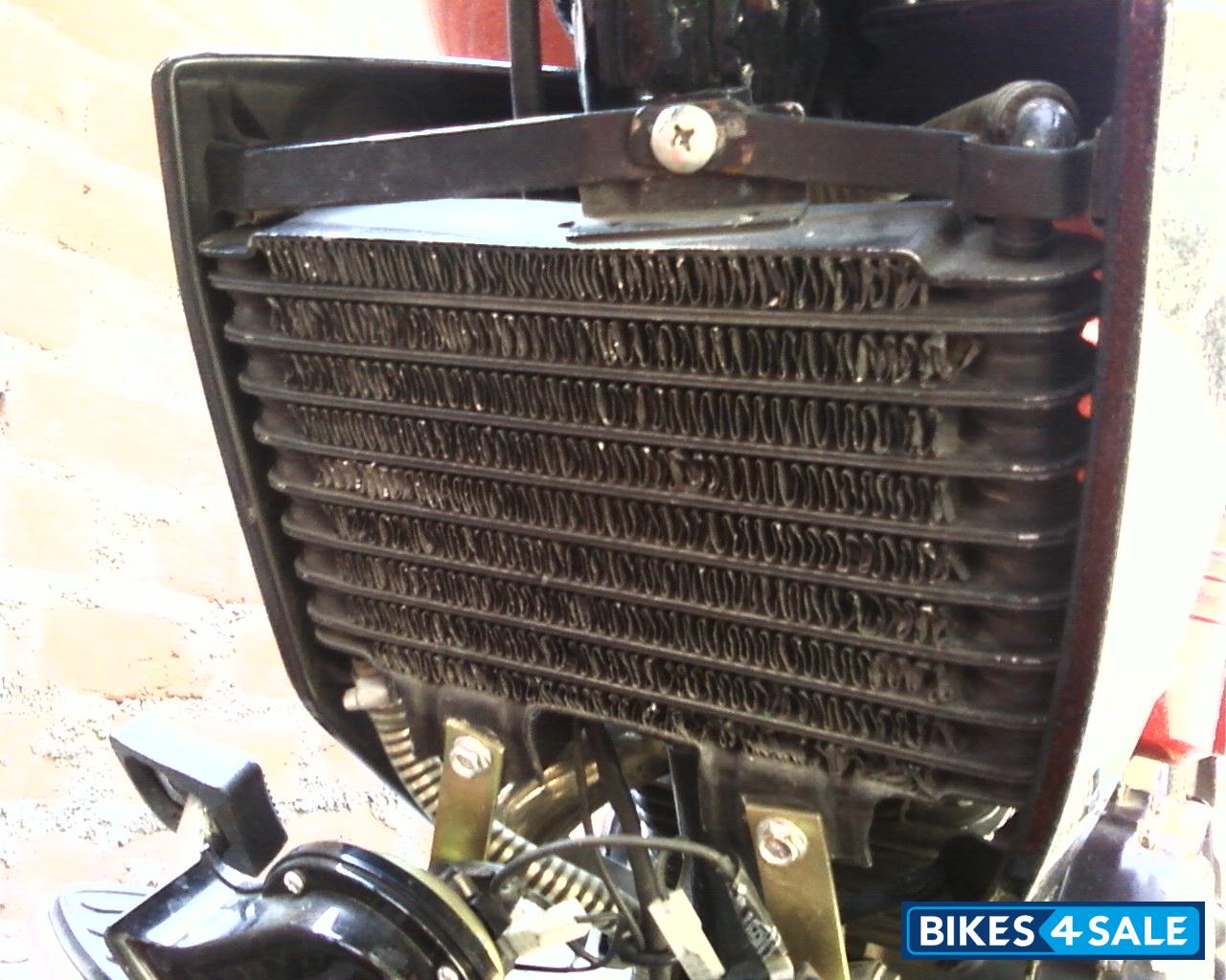 Mahindra Red Metalic Yamaha YBX