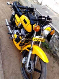 Yellow Yamaha RX 100