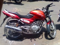 Red Bajaj Pulsar 150 Round Headlight