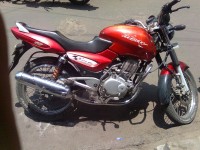 Red Bajaj Pulsar 150 Round Headlight