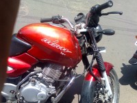 Red Bajaj Pulsar 150 Round Headlight