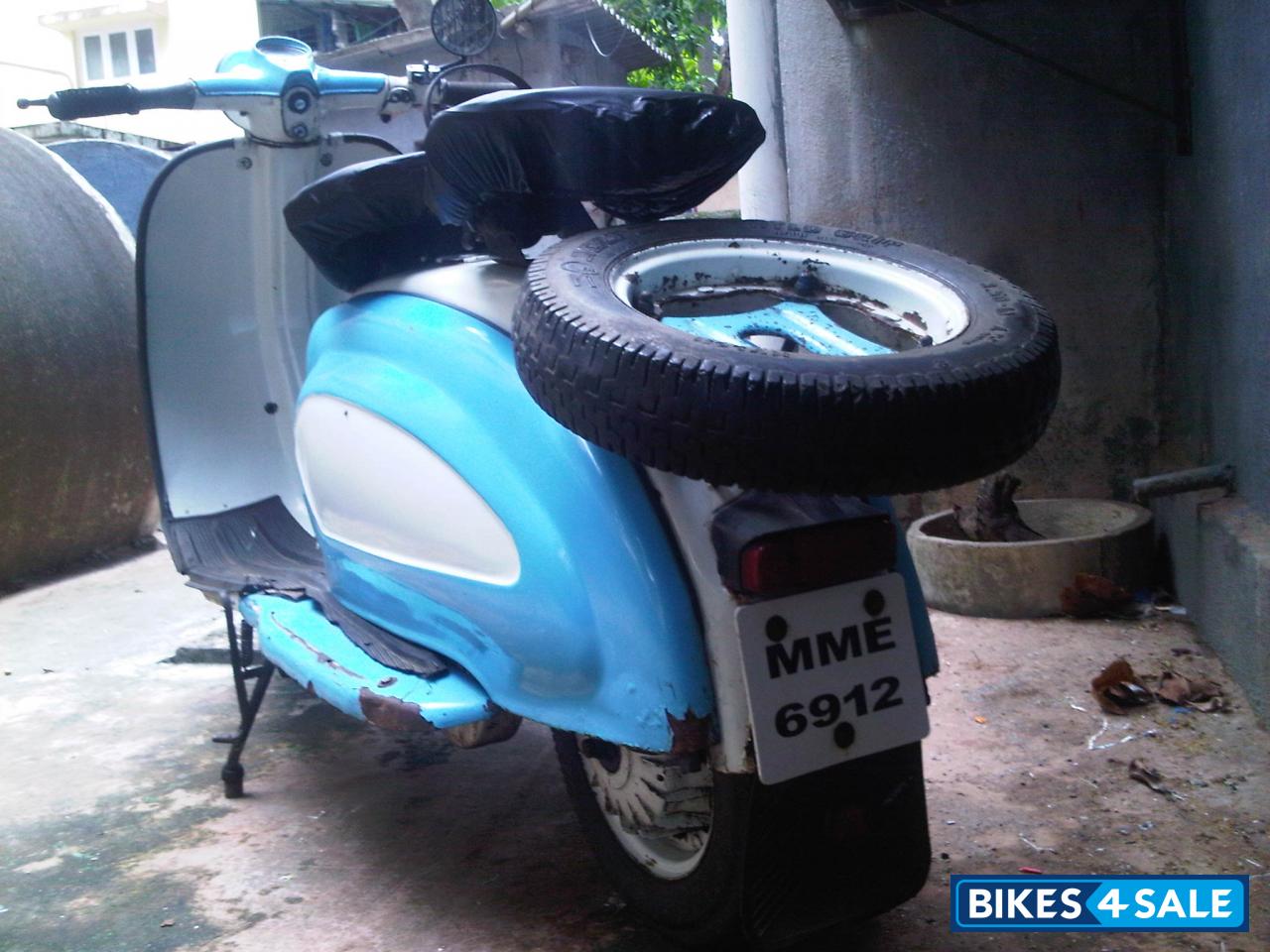 Blue And White Vintage Scooter Lambretta