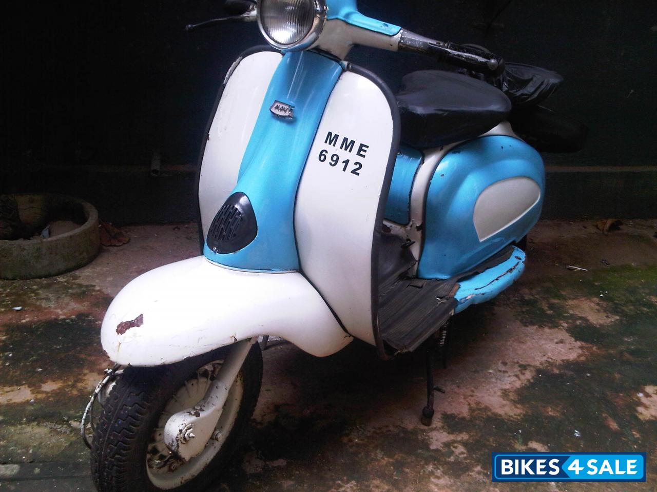 Blue And White Vintage Scooter Lambretta