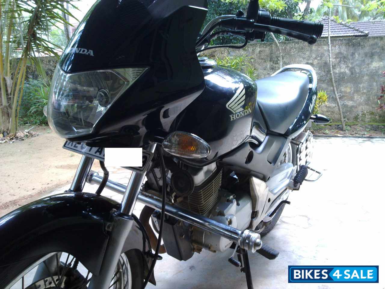 Black Honda Unicorn