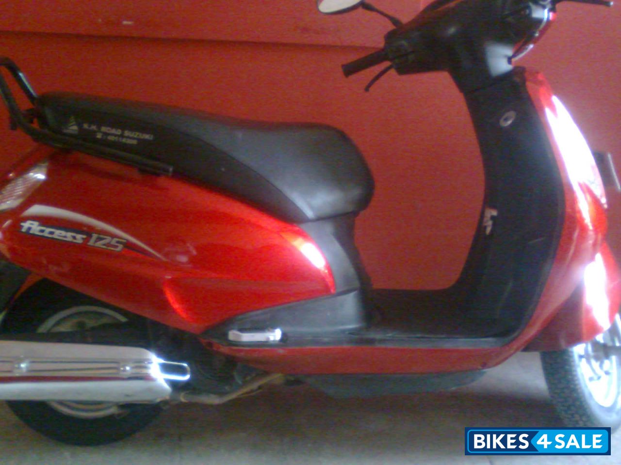Red Suzuki Access 125