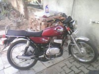Maroon Suzuki MAX 100R