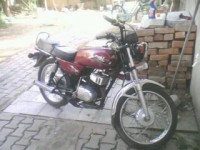 Maroon Suzuki MAX 100R
