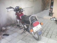 Maroon Suzuki MAX 100R