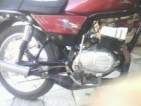 Maroon Suzuki MAX 100R