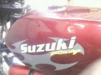 Maroon Suzuki MAX 100R