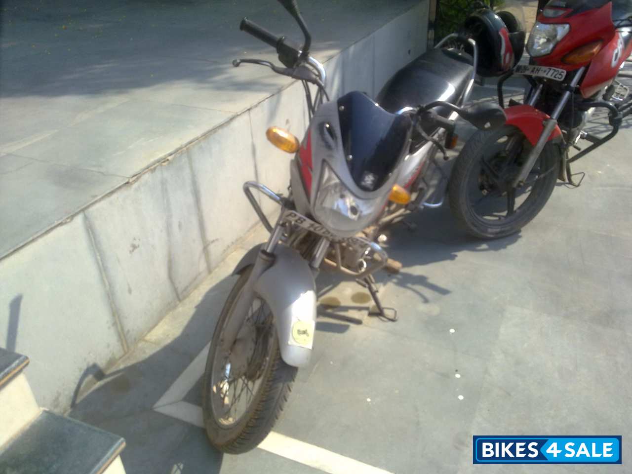 Silver Bajaj Caliber 115