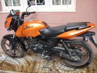 Metallic Orange Bajaj Pulsar 220 DTSi