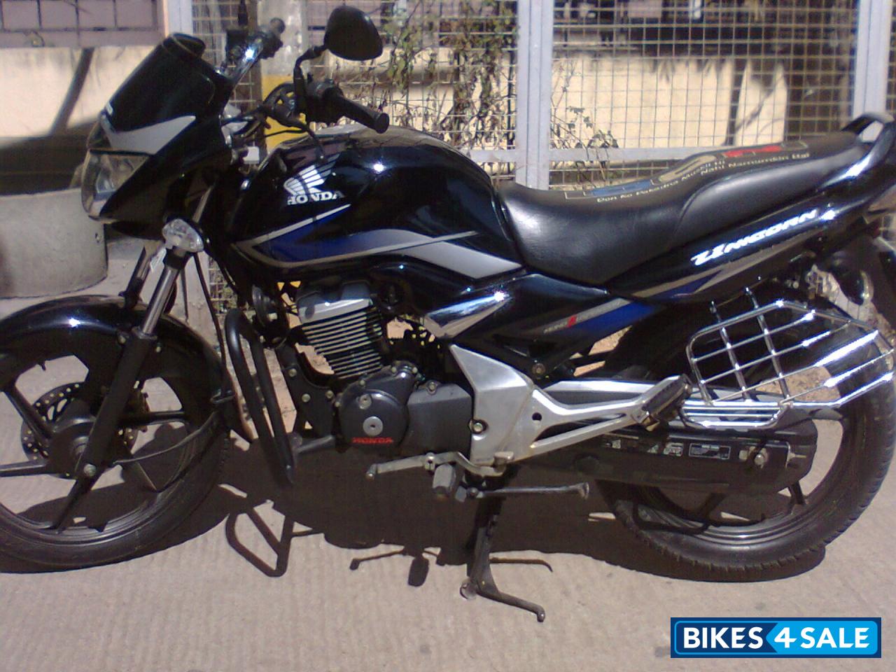 Black Honda Unicorn Sporty