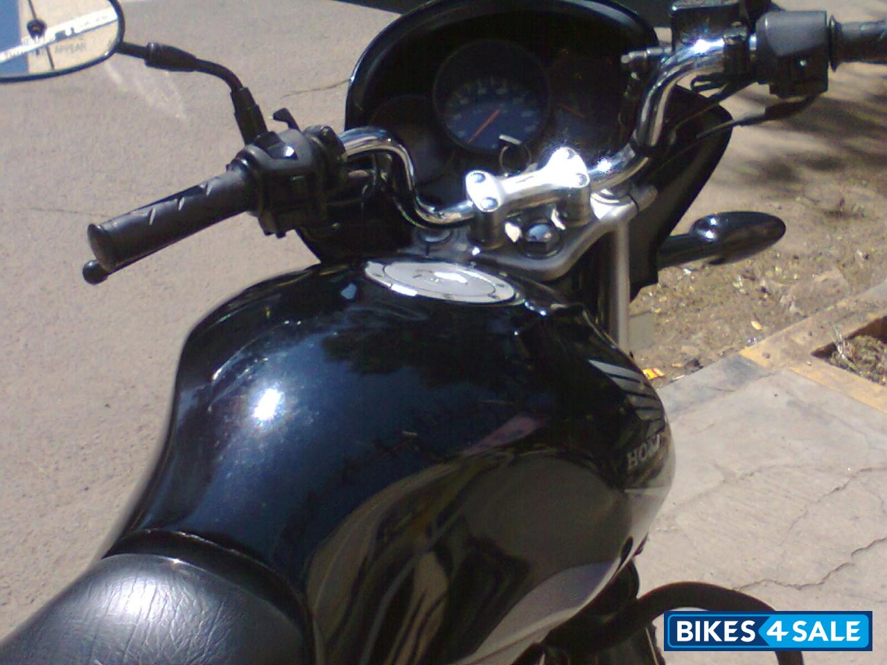 Black Honda Unicorn Sporty