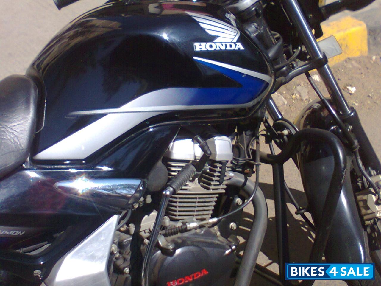 Black Honda Unicorn Sporty