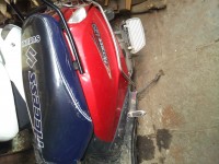 Red Suzuki Access 125