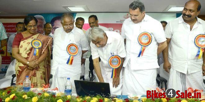 Honourable Chief Minister of Kerala, Oomen Chandy inaugurating e-payment
