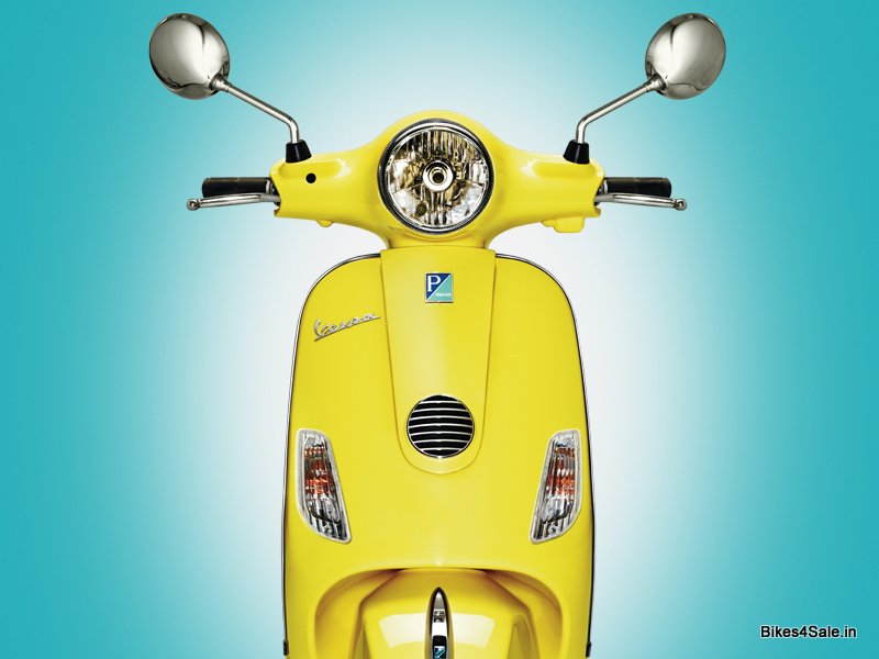 Yellow Vespa LX 125
